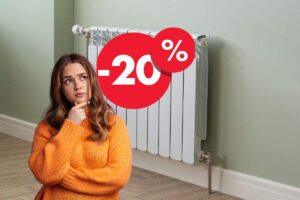 donna che pensa, termosifone e percentuale del 20% in meno
