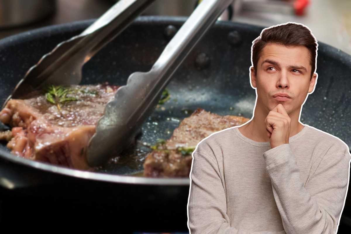 uomo dubbioso e carne in padella