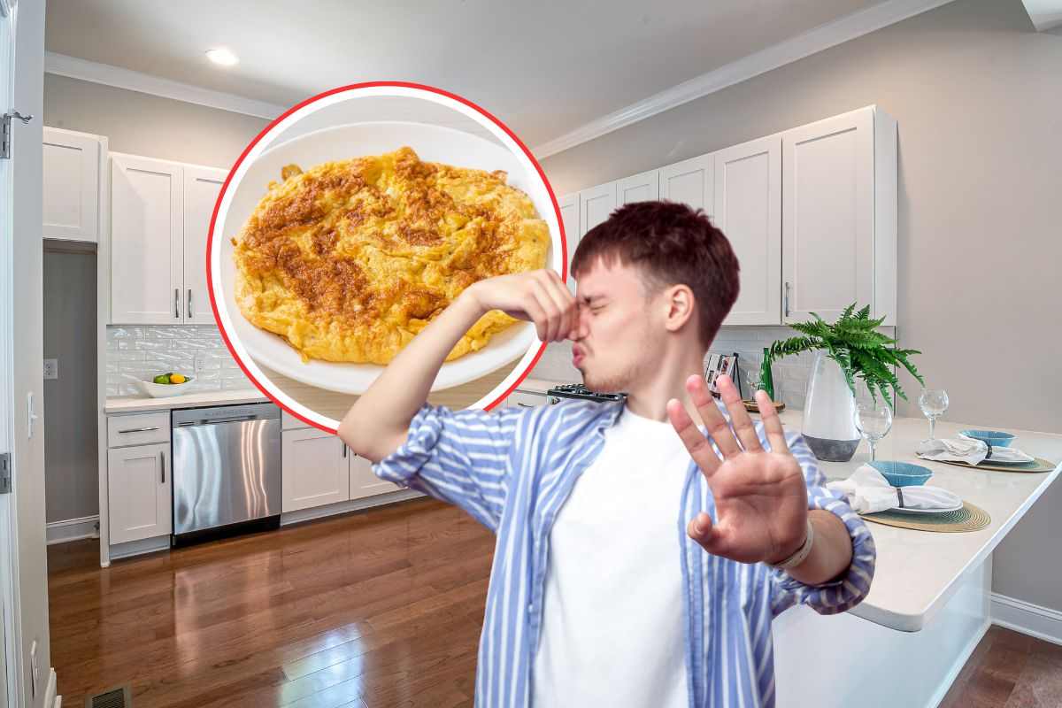 uomo che si tappa il naso, frittata in un cerchio in primo piano e come sfondo una cucina moderna