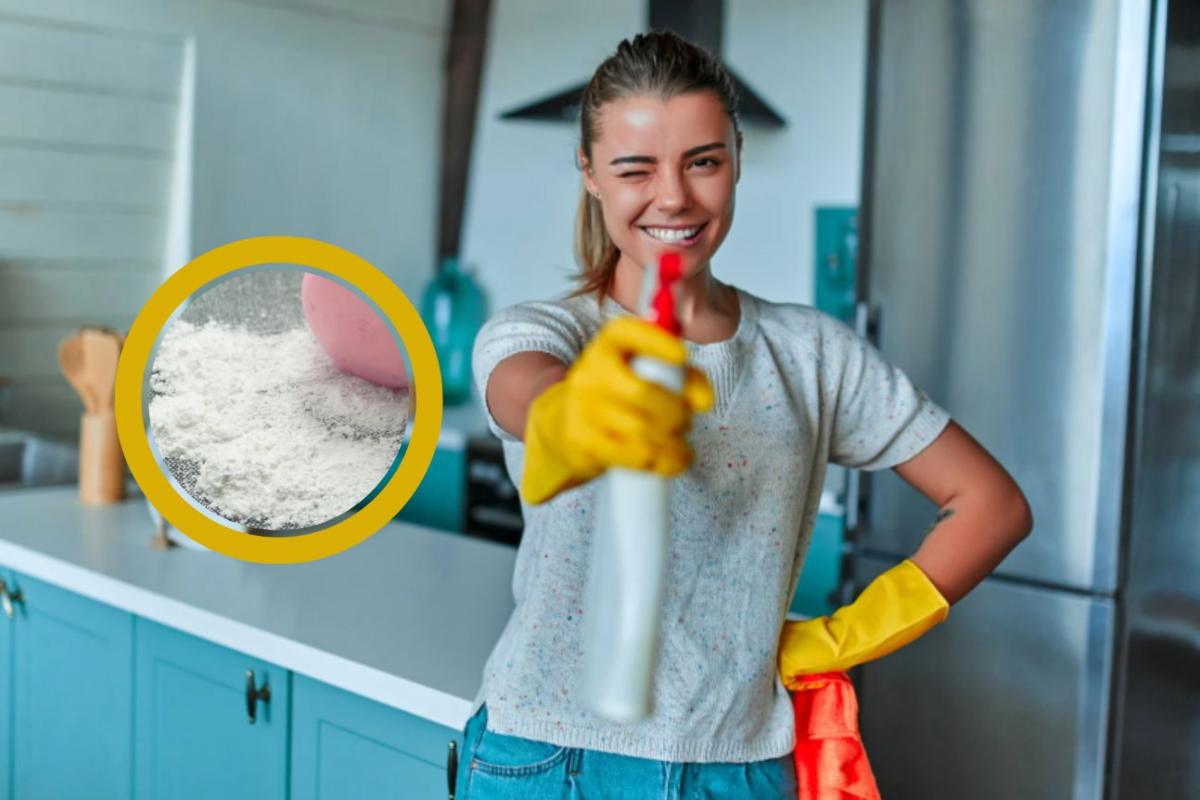donna con in mano un detersivo con lo spruzzino