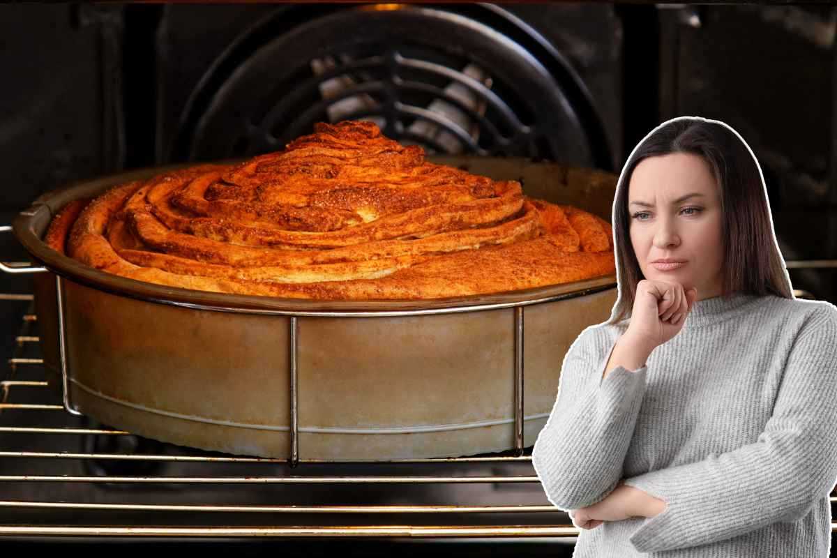 torta in forno e donna preoccupata